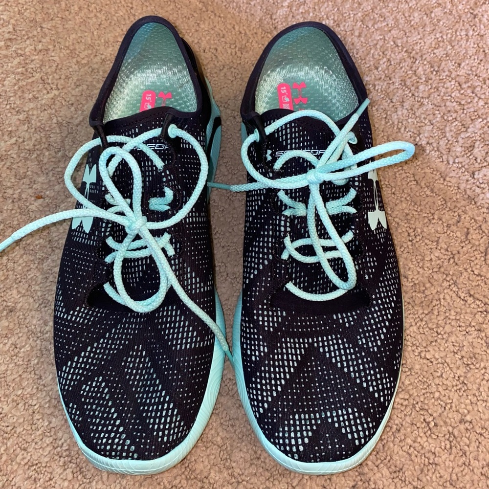 Black Under Armour Running Shoes.